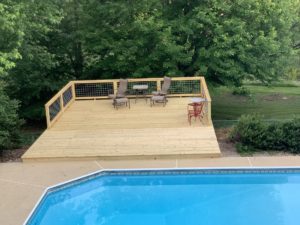 New wooden deck by the pool at Steeles Tavern Manor B&B