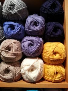 Colorful skeins of yarn in a yarn shop