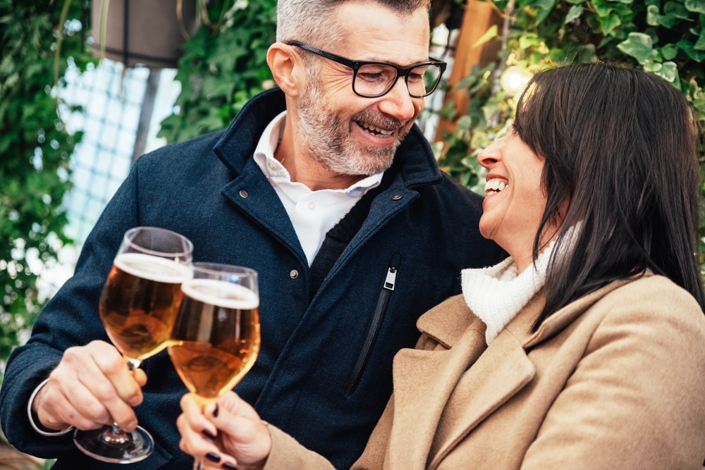 A couple enjoying local beer during their romantic getaways in Virginia