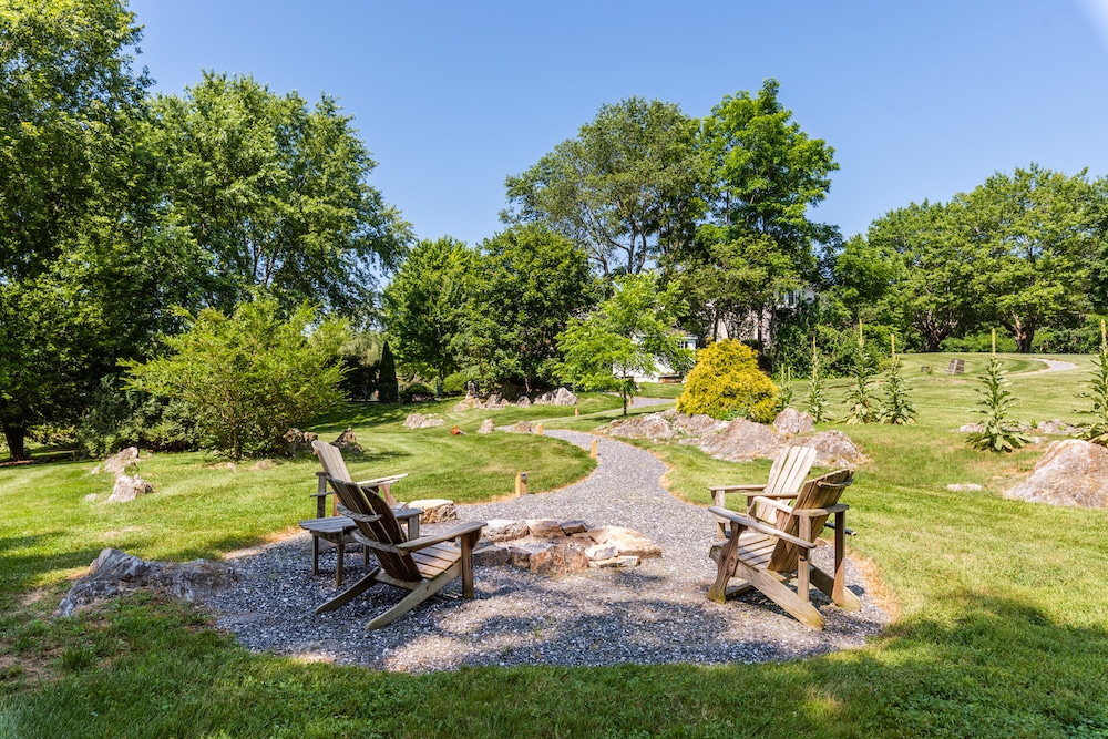 After visiting the top Blue Ridge Parkway waterfalls, relax and unwind on the grounds and enjoy time around this firepit of our Bed and Breakfast in Virginia