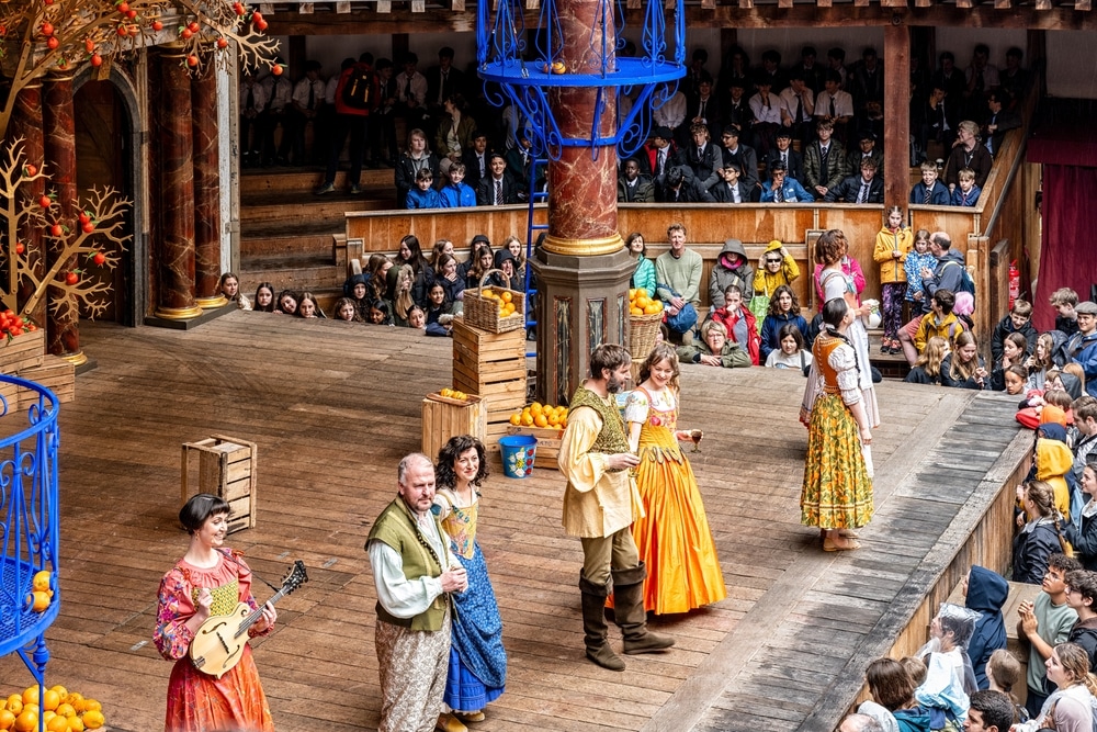 Performance at the Globe in London, similar to the experience you'll have with Blackfriars Playhouse tickets