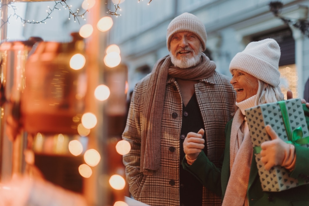 festive couple enjoying holiday shopping in downtown Staunton, VA